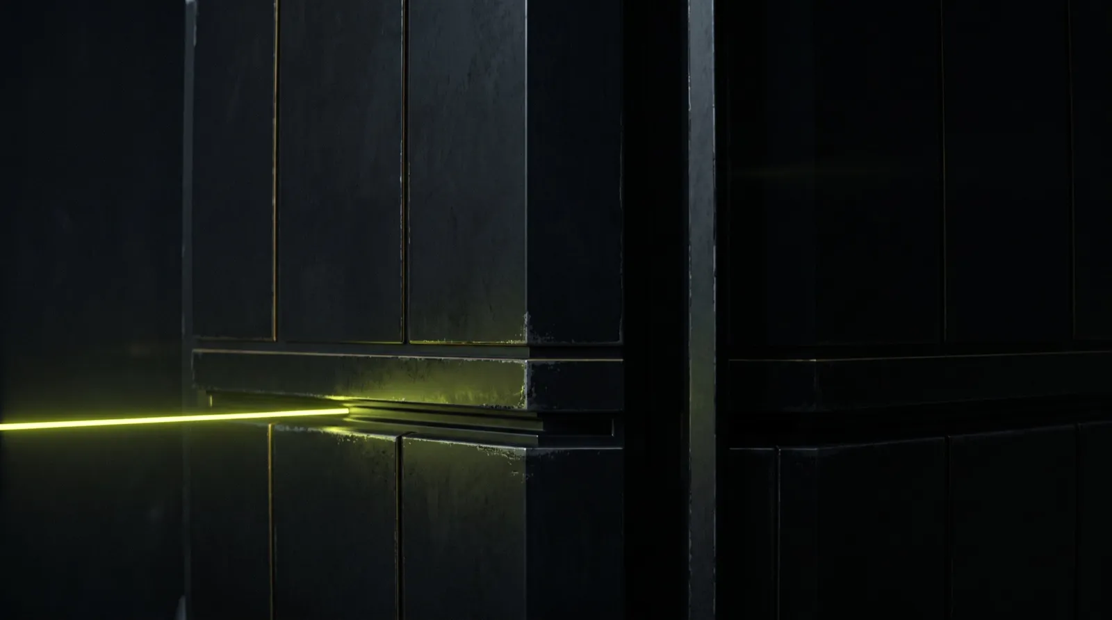 A thin chartreuse signal entering dark infrastructure along a machined seam